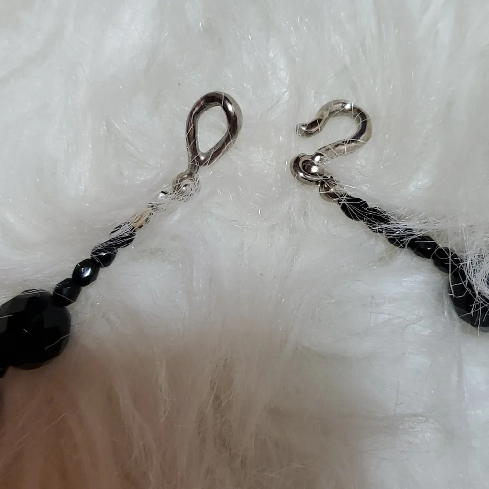 Boutique black, silver tone with a bling bow necklace